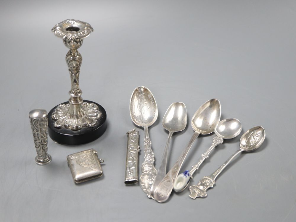 A group of assorted small silver including a small vesta case, a telescopic pencil case and a taper stick (repaired), 11cm